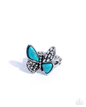 Load image into Gallery viewer, Butterfly-shaped ring with turquoise wings and silver accents on a white background